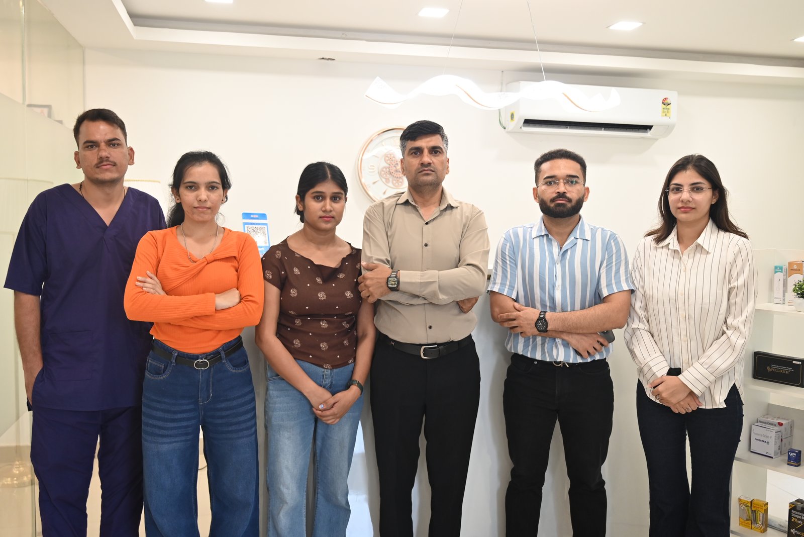 The complete K7 Homecare clinical team standing together at the K7 Homecare centre in Gurugram